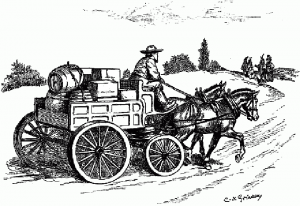 Wagon loaded with belongings on the open road.